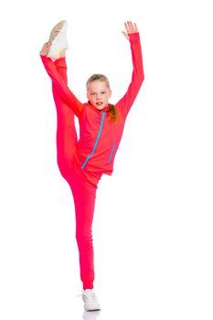 A girl gymnast balances on one leg.The concept of childhood, sport, a healthy lifestyle. Isolated on white background.