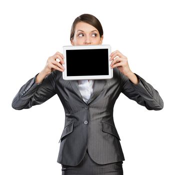Businesswoman with tablet computer looking away. Portrait of attractive woman in formalwear showing tablet PC near her face. Corporate businessperson and digital technology layout with copy space