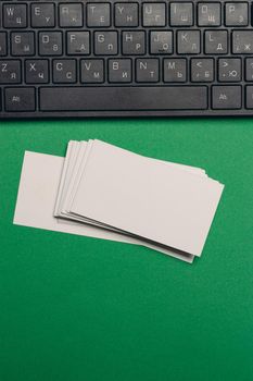 desktop keyboard business cards copy-space top view. High quality photo