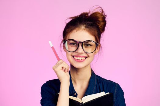 woman secretary with notepad and pencil office work pink background. High quality photo