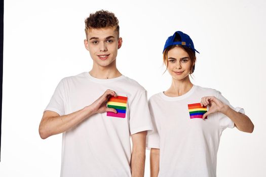 young couple lgbt Flag transgender lifestyle light background. High quality photo