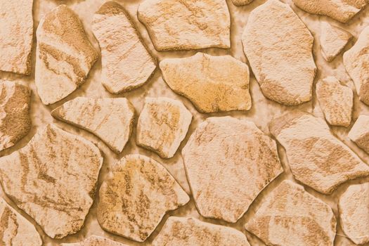 Sand orange wallpaper texture with abstract stone pattern background.