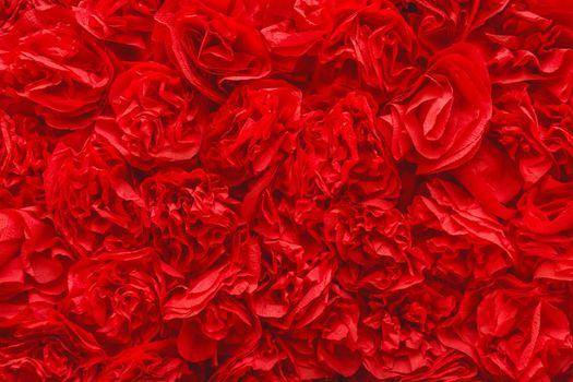 Red vintage paper roses texture background, abstract pattern wallpaper, flowers handmade.