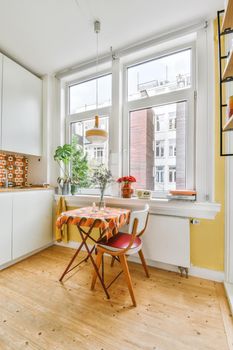 Bright dining room with decorative table and chairs