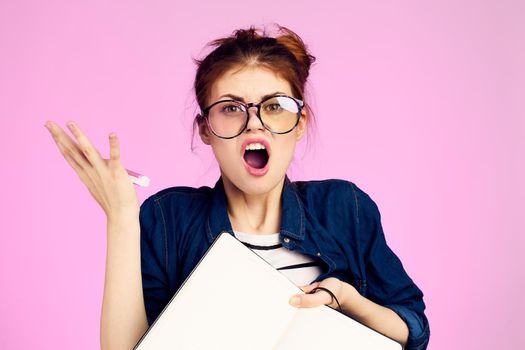 woman secretary with notepad and pencil office work pink background. High quality photo
