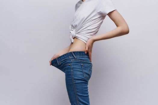 woman measure waist slim figure diet lifestyle. High quality photo