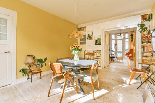 Modern dining room in a luxury house with individual design