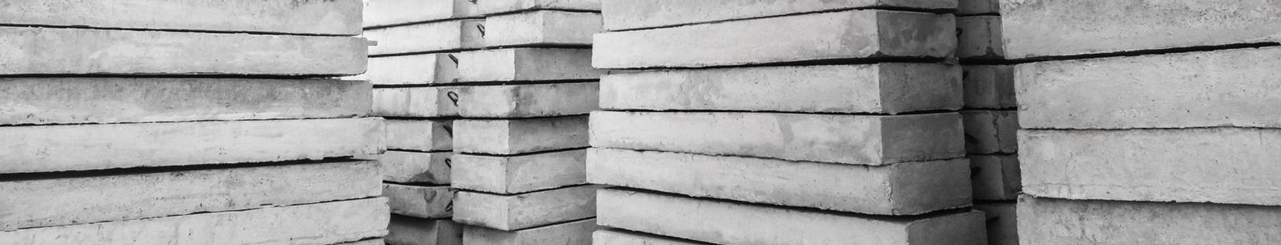 Concrete blocks at a construction site. Concrete structures, industrial, building materials, high resolution.