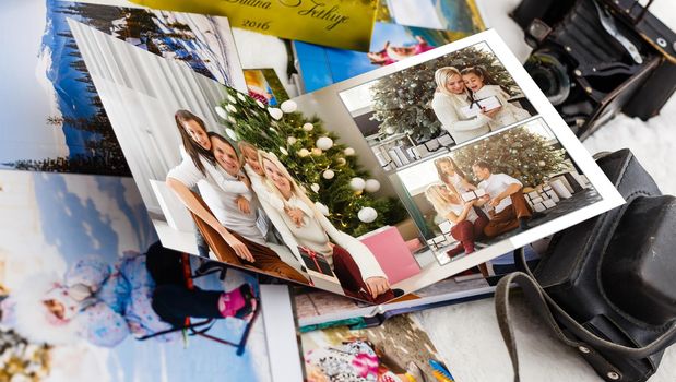 photobook with christmas photos. Winter cozy.