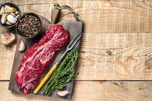 Butchers choice steak Onglet Hanging Tender beef meat. wooden background. Top view. Copy space.