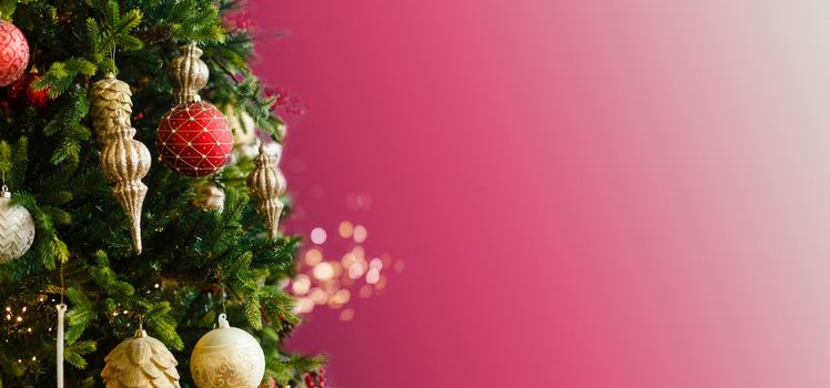Decorated Christmas tree closeup, balls, garland.