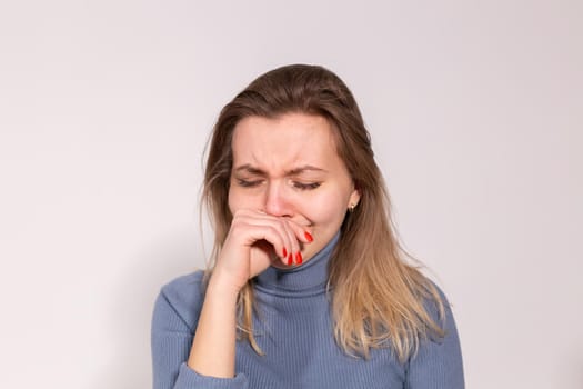 People, violence and abuse concept - Close-up portrait of crying woman with smeared mascara.