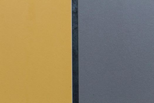 yellow gray out with a black stripe half a third diagonally goriontali vertical background.