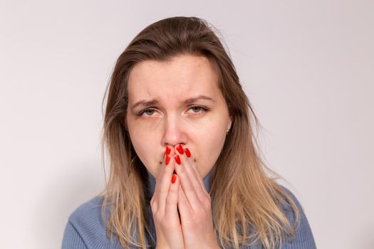 People, violence and abuse concept - Close-up portrait of crying woman with smeared mascara.