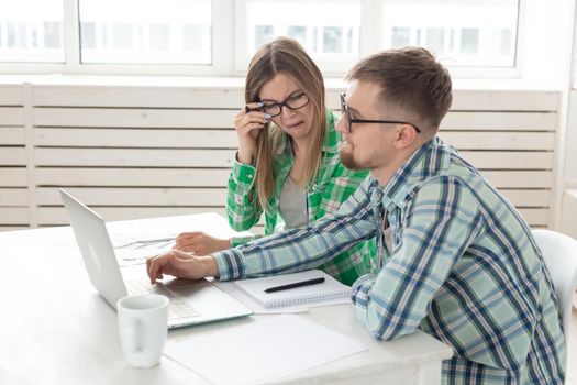 Upset husband and wife consider the total costs of payments and purchases made over the past month. The concept of low standard of living of students