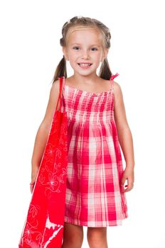Adorable litle girl with red shopping bag isolated on a white background