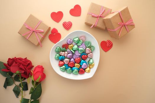 heart shape gift , rose flower on table ,