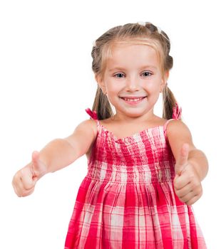 Smiling little girl showing thumbs up isolated on a white background