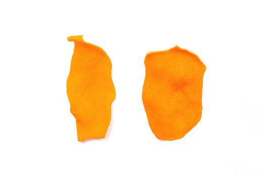 2 Dried orange peels isolated on a white background, close-up.