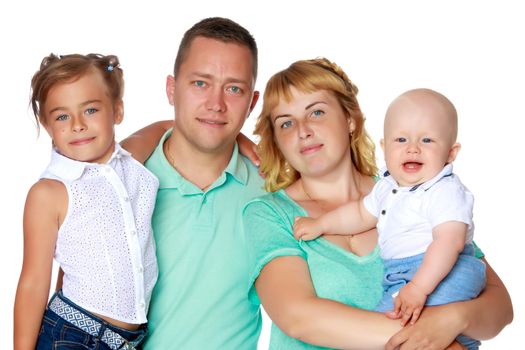 Happy family with young children. The concept of family happiness and development of children. Isolated on white background.