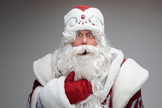 surprised father frost with long beard, picture isolated on light grey background