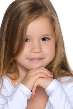 Beautiful little girl close-up. The concept of beauty and fashion, happy childhood. Isolated on white background.