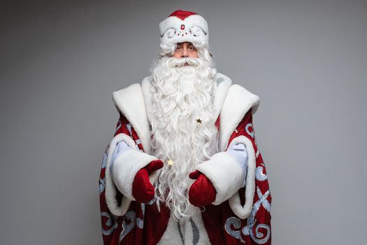 father frost looks to the camera, picture isolated on white background