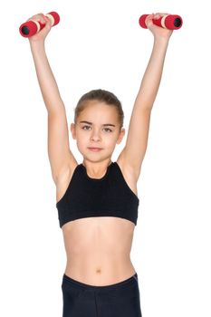 A cute little girl doing exercises with dumbbells. The concept of strength, health and sport. Isolated on white background.