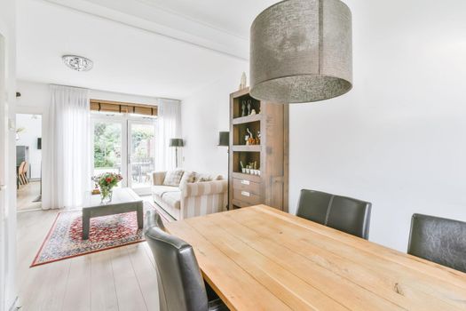 Elegant dining room with black leather chairs