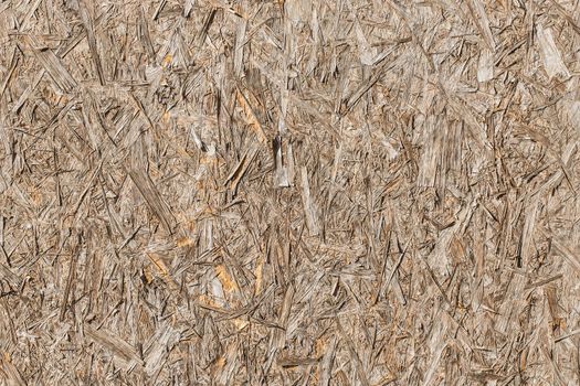 Chipboard light grey surface, pressed wood texture background.