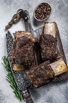 Barbecue short chuck beef ribs with herbs. White background. Top view.