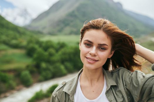 Woman tourist mountains travel landscape nature vacation. High quality photo