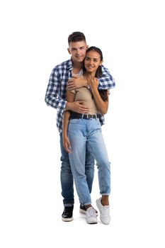 Guy hugs the girl behind. Happy couple Isolated on white background