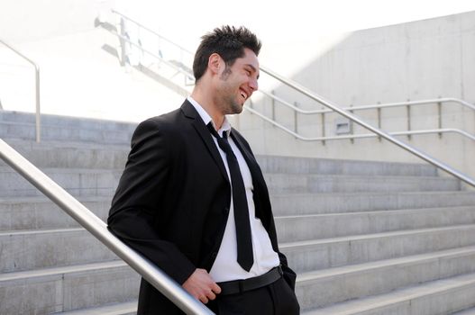 Portrait of a handsome young smiling business man