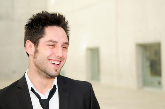 Portrait of a handsome young business man smiling