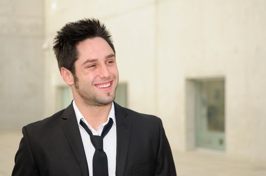 Portrait of a handsome young businessman smiling