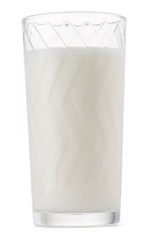 Glass of milk isolated on white background close up