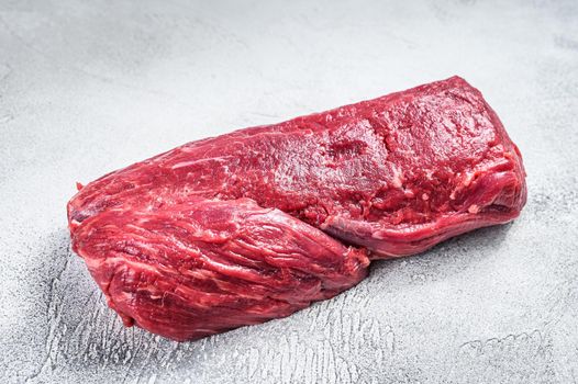 Raw Whole Tenderloin beef meat. White background. Top view.