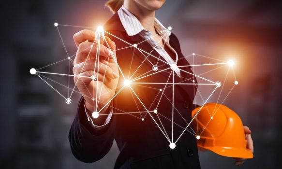 Businesswoman pointing on abstract network structure. Woman engineer in business suit holding safety helmet. Engineering and project management. Global cloud technology and internet communication