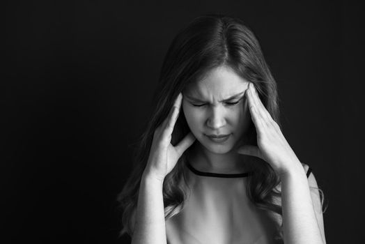 Pain girl head weight photo in BW close-up