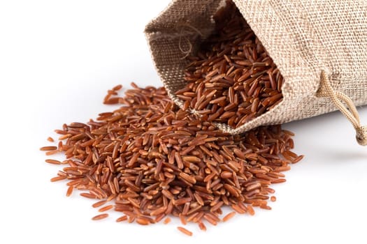 Heap of red rice isolated on white background