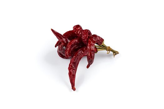 Dried red chili peppers isolated on white background