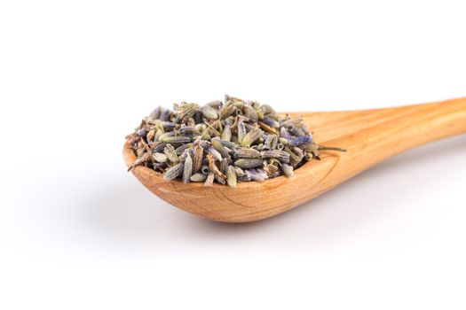 dried lavender organic tea in wooden spoon Isolated on white background