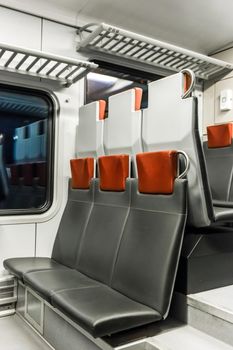 Electric train stadler modern interior with leather seats.