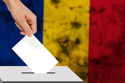 hand drops the ballot election against the background of the flag, concept of state elections, referendum