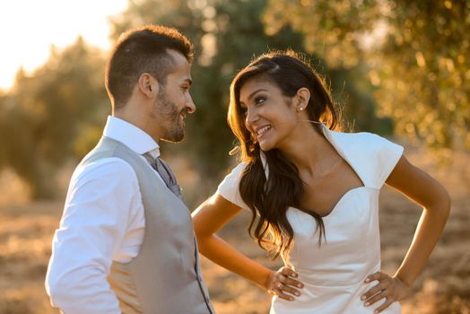 Just married couple together in nature background