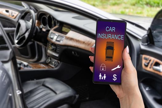woman hand holding smartphone to use car insurance application online after his broken car. Insurance concept