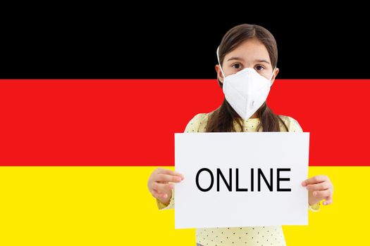 Masked little girl face looking at the camera on flag Germany background. The concept of attention to the worldwide spread of the coronavirus worldwide. Coronavirus, virus in Germany.