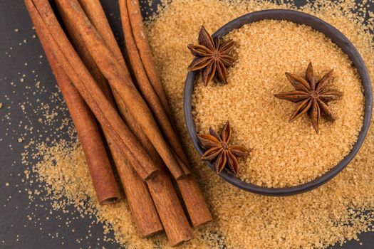 star anise and cinnamon on a background of the tropical brown sugar