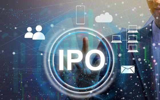 Businessman presses button ipo Initial Public Offering network on chart